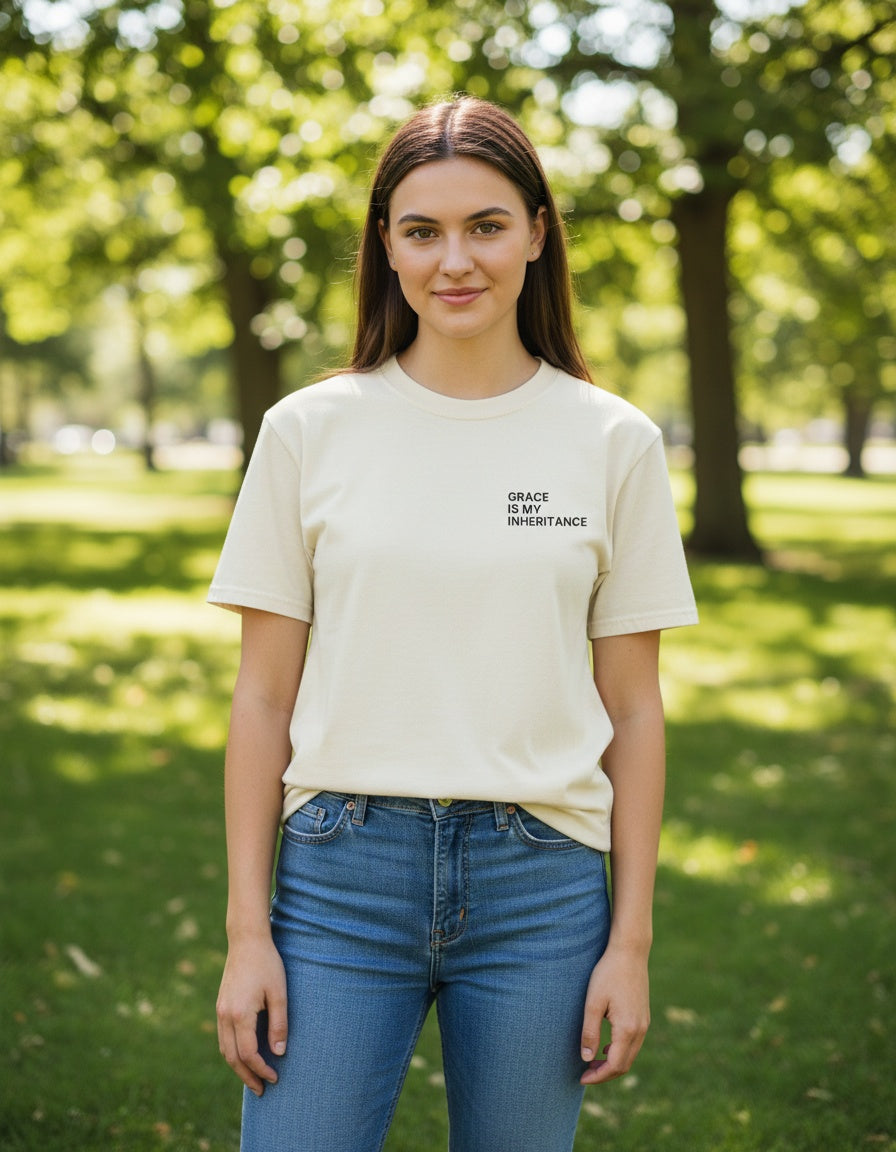 Woman wearing an ivory Grace Is My Inheritance Christian t-shirt, front chest print
