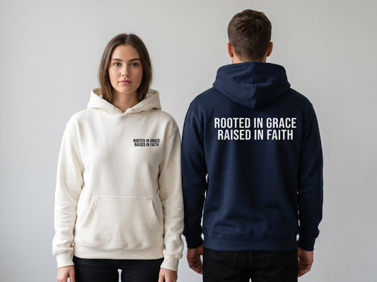 Couple wearing Rooted in Grace. Raised in Faith Christian hoodies, front chest print and large back print