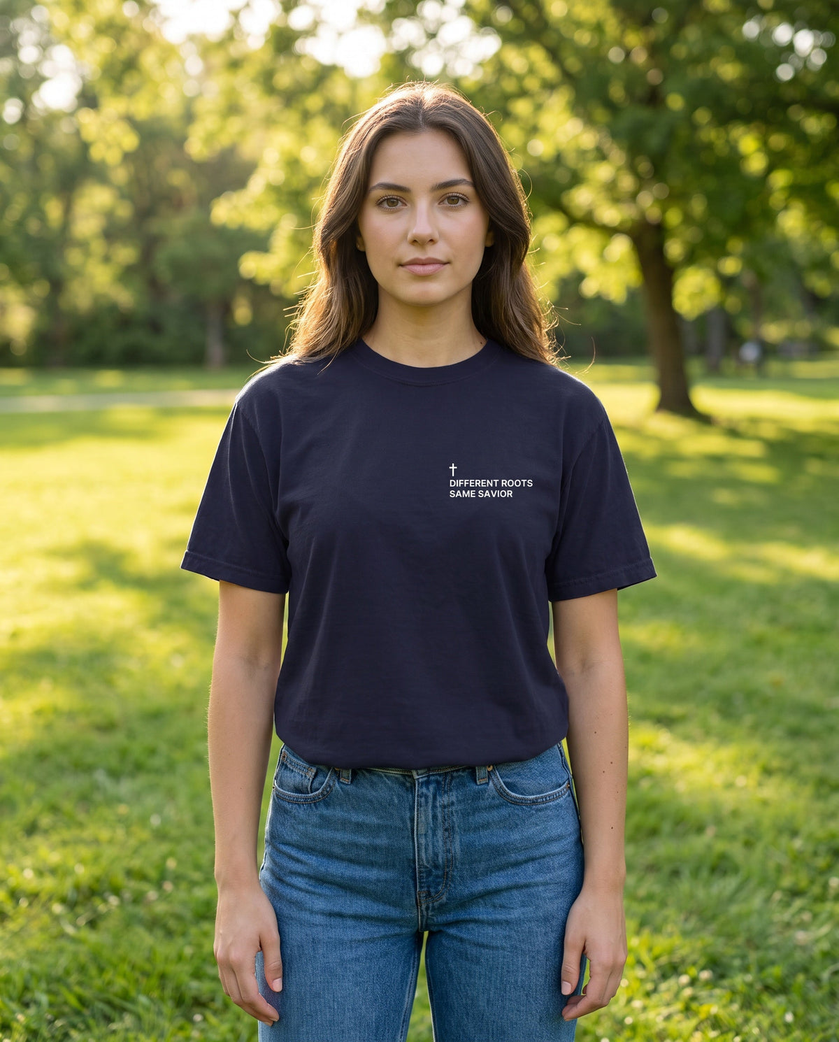 Woman wearing a truenavy Different Roots. Same Savior Cross Edition Christian t-shirt with cross chest print