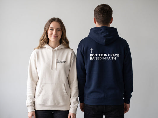 Couple wearing Rooted in Grace. Raised in Faith Cross Edition Christian hoodies, front chest print and large back print