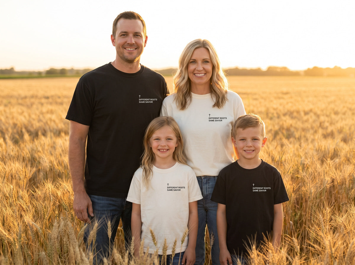 Family wearing matching Different Roots. Same Savior Cross Edition Christian t-shirts