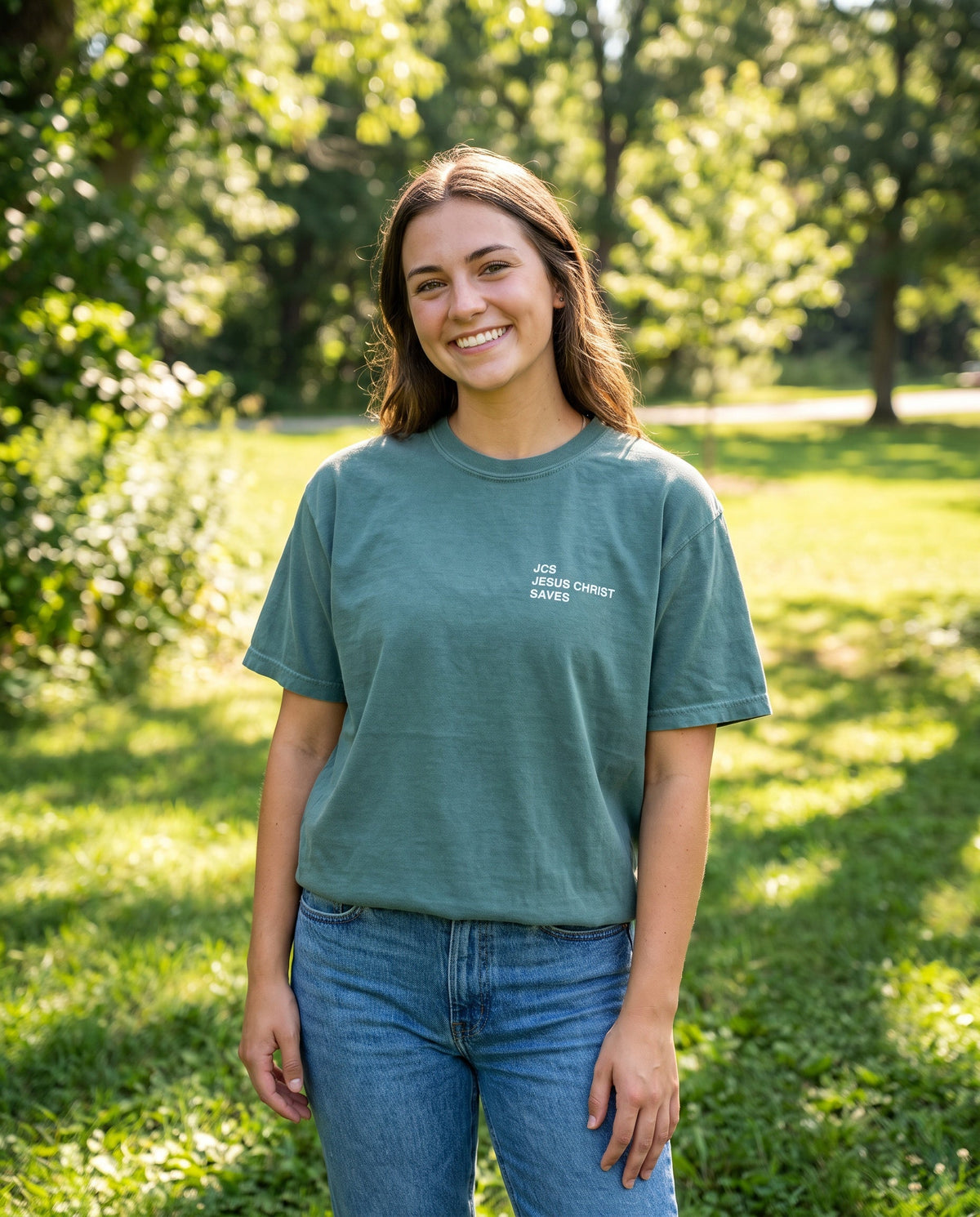 Woman wearing a bluespruce JCS — Jesus Christ Saves Christian t-shirt, chest print