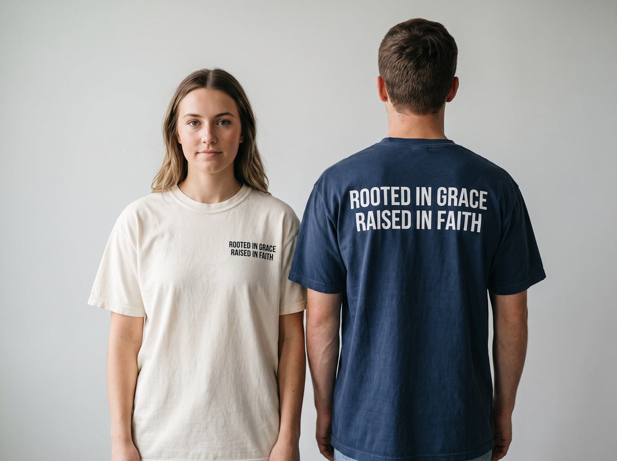 Couple wearing Rooted in Grace. Raised in Faith Christian t-shirts, front chest print and large back print