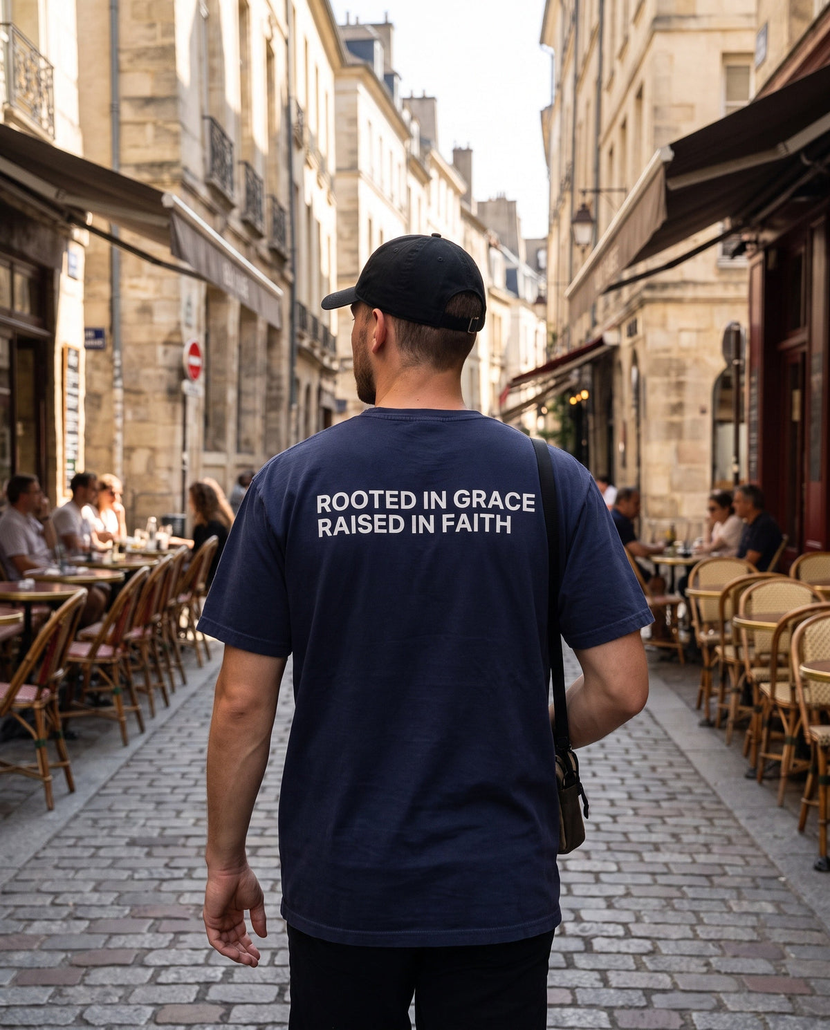 Back of a truenavy Rooted in Grace. Raised in Faith Christian t-shirt showing the large back print