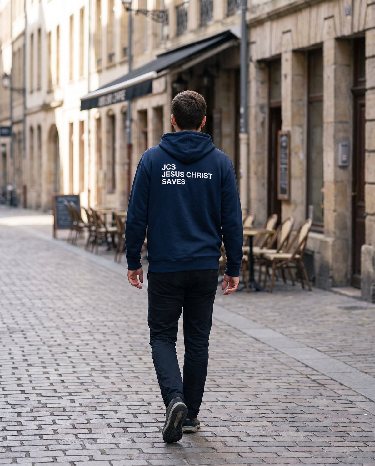 Back of a navy JCS — Jesus Christ Saves Christian hoodie showing the large back print