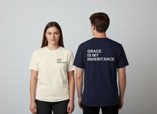 Couple wearing Grace Is My Inheritance Christian t-shirts, ivory front with chest print and true navy back with large back print