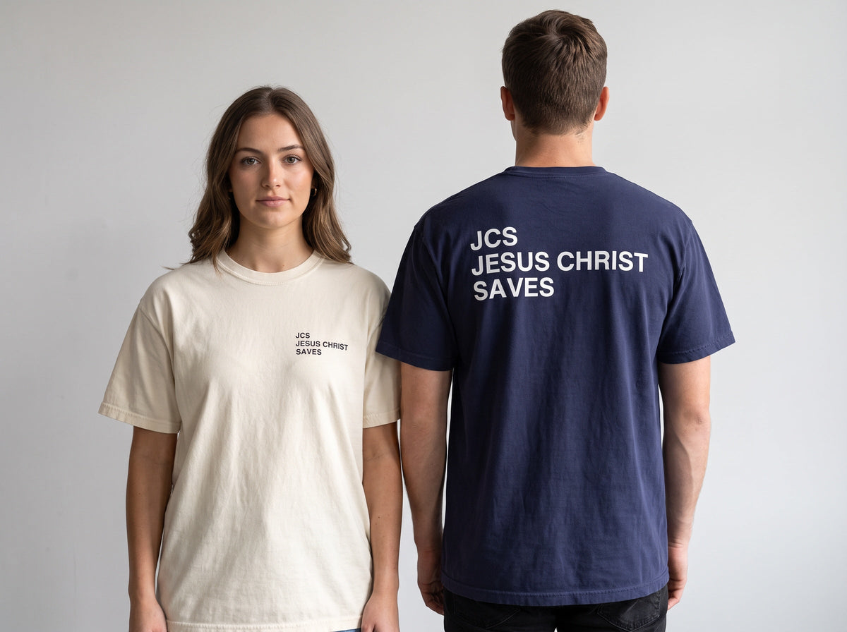 Couple wearing JCS — Jesus Christ Saves Christian t-shirts, front chest print and large back print