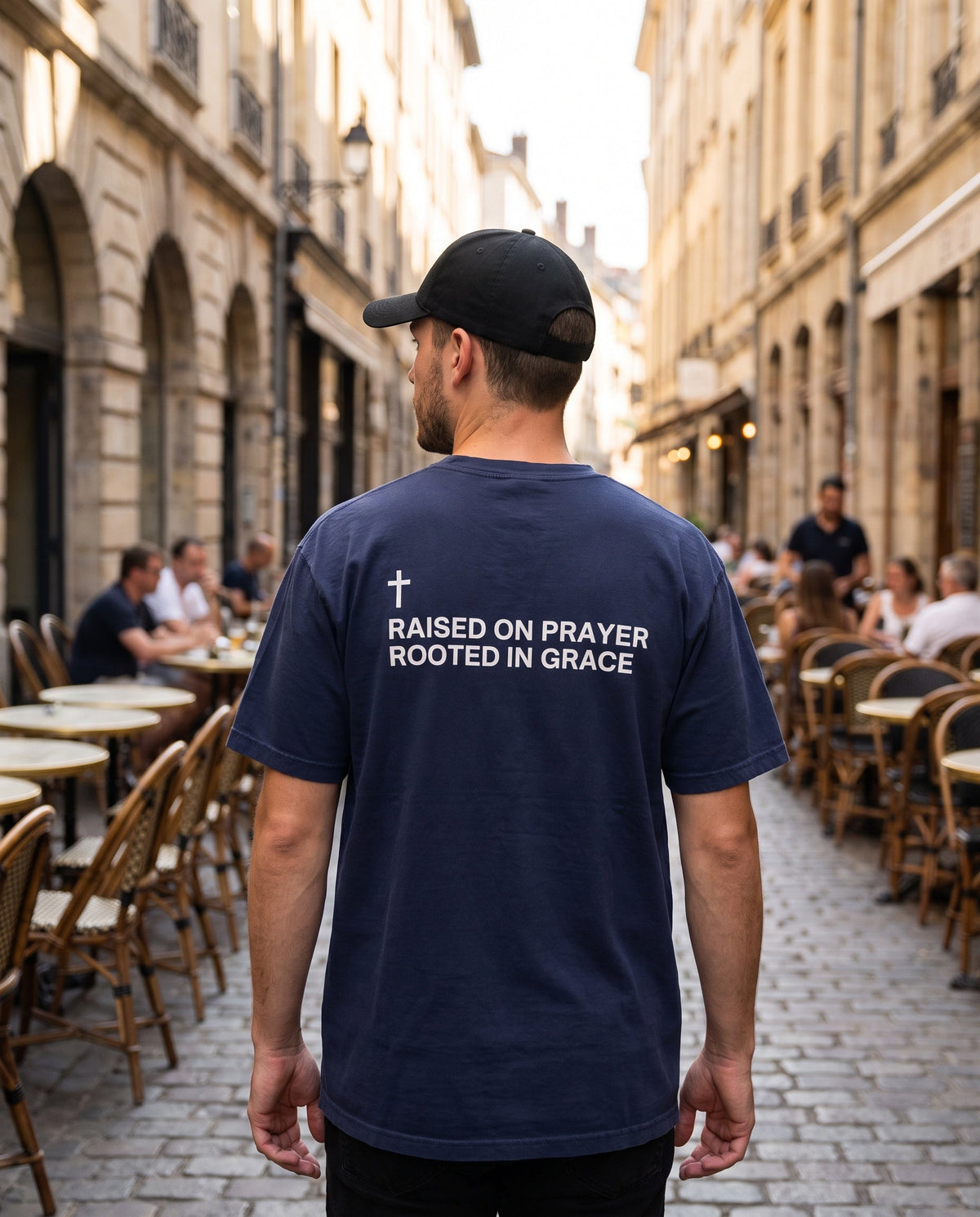 Back of a truenavy Raised on Prayer. Rooted in Grace Cross Edition Christian t-shirt showing the large back print