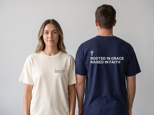 Couple wearing Rooted in Grace. Raised in Faith Cross Edition Christian t-shirts, front chest print and large back print