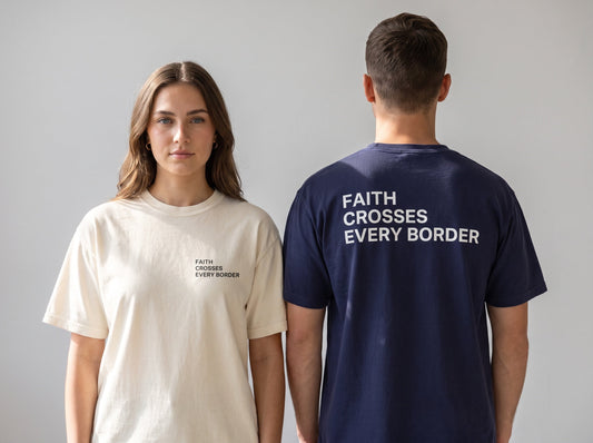 Couple wearing Faith Crosses Every Border Christian t-shirts, front chest print and large back print