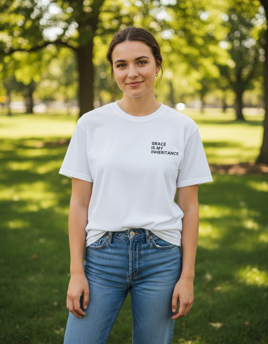 Woman wearing a white Grace Is My Inheritance Christian t-shirt, front chest print