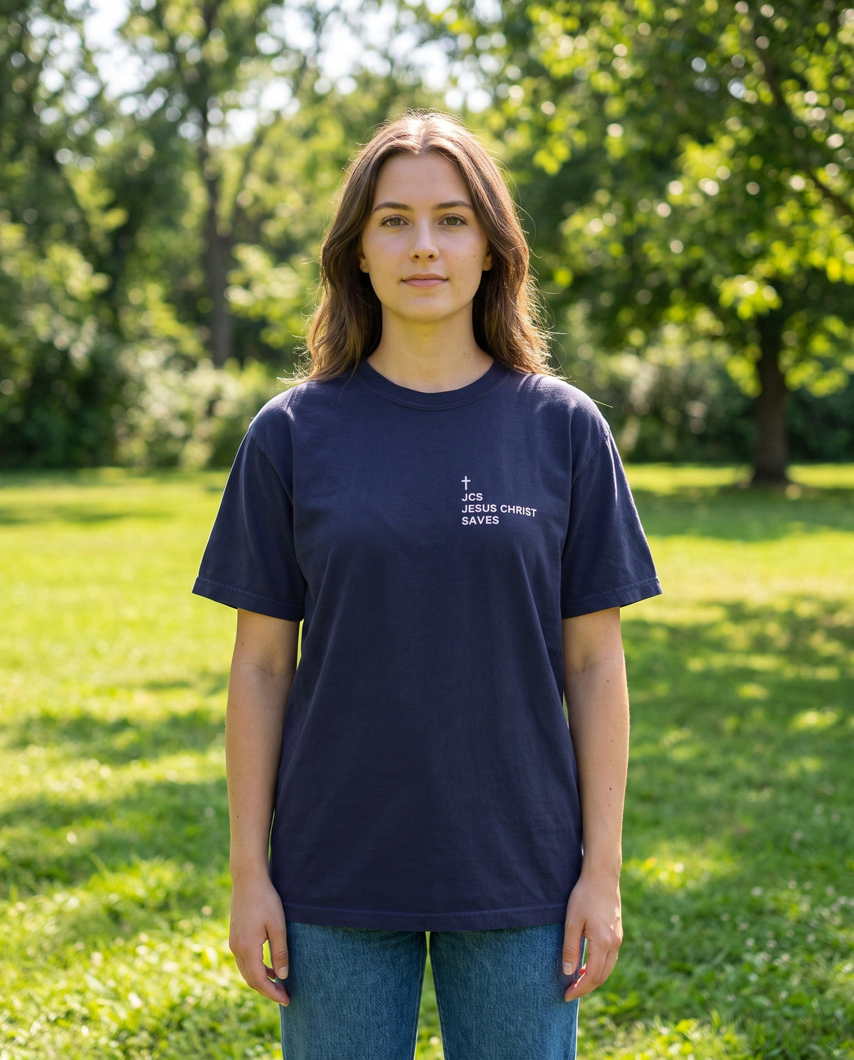 Woman wearing a truenavy JCS — Jesus Christ Saves Cross Edition Christian t-shirt with cross chest print